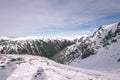 mountain tops in winter covered in snow - vintage film look Royalty Free Stock Photo