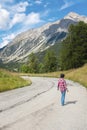 Mountain tourist outdoor leisure activity concept. Woman looking the sky. Tourism and tourist summer holiday vacation. Country