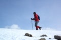 Mountain tourist on snow slope Royalty Free Stock Photo