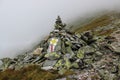 Mountain trail markers on a pile of rocks Royalty Free Stock Photo