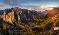 Mountain trail Pico do Arieiro, Madeira Island, Portugal Scenic view of steep and beautiful mountains and clouds during sunrise Royalty Free Stock Photo