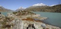 Mountain-Trekking in the Swiss Alps at LAgo Bianco on the Bernina Hospitz Royalty Free Stock Photo