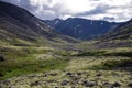 Mountain tundra with mosses and rocks covered with lichens, Hibiny mountains above the Arctic circle, Kola peninsula, Russia Royalty Free Stock Photo