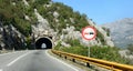 Mountain tunnel, highway road.