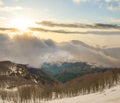 Mountain valey in a dense clouds