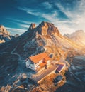 Mountain valley with beautiful house and church at sunset Royalty Free Stock Photo