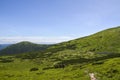 Mountain valley and camping near Nesamovyte lake among a green mountains. Carpathians, Ukraine Royalty Free Stock Photo