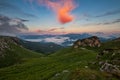 Mountain valley covered with clouds at sunset Royalty Free Stock Photo