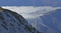 Mountain valley covered by fog