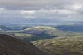 Mountain valley with mosses and rocks covered with lichens. Cloudy sky before storm. Khibiny mountains above the Arctic Royalty Free Stock Photo