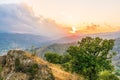 Mountain valley during sunset or sunrise. Natural spring or summer season landscape Royalty Free Stock Photo