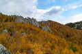 Mountain view at the beginning of golden autumn in clear weather