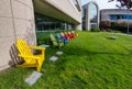 Mountain View, CA, USA - April 27 2017 Colorful google chairs placed oh green grass lawn on a sunny day Royalty Free Stock Photo