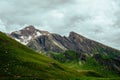 Mountain view Mannlichen. Snowy mountain ridges and deep valleys with green fields, Bernese Oberland, Switzerland Alps Royalty Free Stock Photo