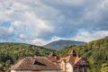 Mountain from view with small village sunny day. Sunny summer morning in the mountains and a small village. Country road in the Royalty Free Stock Photo