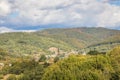 Mountain from view with small village sunny day. Sunny summer morning in the mountains and a small village. Country road in the Royalty Free Stock Photo