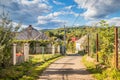 Mountain from view with small village sunny day. Sunny summer morning in the mountains and a small village. Country road in the Royalty Free Stock Photo