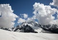 Snowy peaks of Dombai mountains in the late spring Royalty Free Stock Photo