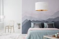 Mountain wallpaper in bedroom interior Royalty Free Stock Photo