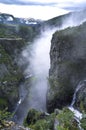 Mountain waterfall in forest. Norway. Hiking background