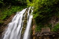 Mountain waterfall with pure water and green vegetation Royalty Free Stock Photo