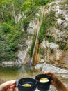 Two at the waterfall of the bride's veil