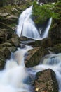 Mountain waterfall river stream view. Forest waterfall in mountains. Small stream in autumn season, colorful landscape. Beautiful Royalty Free Stock Photo