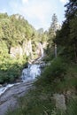 Mountain waterfall Salt de Rebet in forest, Braone Valley, Italy