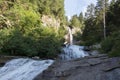 Mountain waterfall Salt de Rebet in forest, Braone Valley, Italy