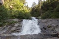 Mountain waterfall Salt de Rebet in forest, Braone Valley, Italy