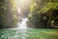 Mountain waterfall in Sunny day.