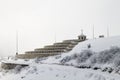 Mountain winter landscape. Mount Grappa war memorial building view