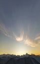 Mountain winter panorama landscape at dawn. Steep mountain peaks covered with snow and woody hills with spruce forest, raising Royalty Free Stock Photo