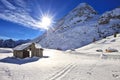 Mountain wooden cabin logs in the Dolomites, Passo Fedaia