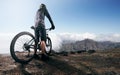 Mountainbiker reaches the peak Royalty Free Stock Photo