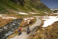 Mountainbikers riding in the Alps Royalty Free Stock Photo