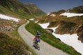 Mountainbikers riding in the Alps Royalty Free Stock Photo