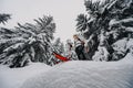 Mountaineer backcountry ski waling two ski alpinist in the mountains. Ski touring in alpine landscape with snowy trees. Adventure