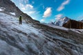 Mountaineer climbing glacier Mont Blanc mountains, France Alps