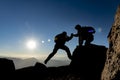 mountaineer help,determination of accomplishment together Royalty Free Stock Photo