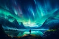 The mountaineer looks admiringly at the northern lights or Aurora phenomenon.