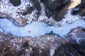 Mountaineer Man is leading on Ice. Ice Climbing on Frozen Waterfall, Aerial Top-Down View. Barskoon Valley, Kyrgyzstan