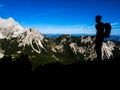 Mountaineer silhouette on the slope of the Prisank mountain