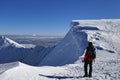 Mountaineer on snowy summit Royalty Free Stock Photo