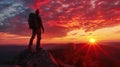 The mountaineer is on the summit contemplating the landscape.