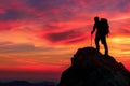 The mountaineer is on the summit contemplating the landscape.