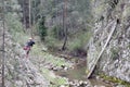 Mountaineer taking a photograph in the mountains