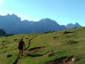 A mountaineer hiking near Vega de Ario, in The Anillo of Picos de Europa, Spain Royalty Free Stock Photo