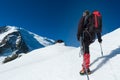 Mountaineer walking on the glacier during the climb of Mont Blan