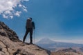 Mountaineer Walking On The Mountain with view at popocatepetl volcano